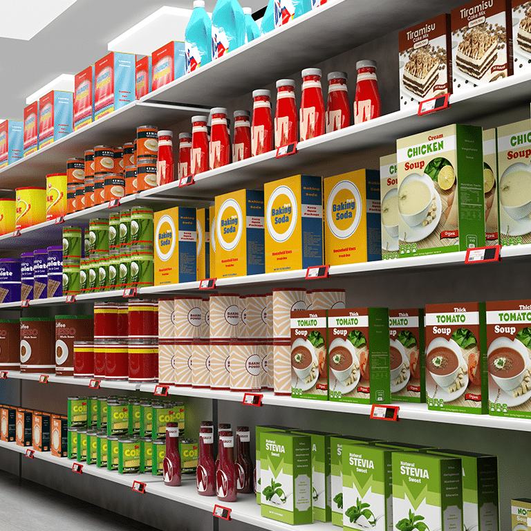 Supermarket shelves stocked with packaged grocery items including canned goods, soup, baking soda, and stevia.