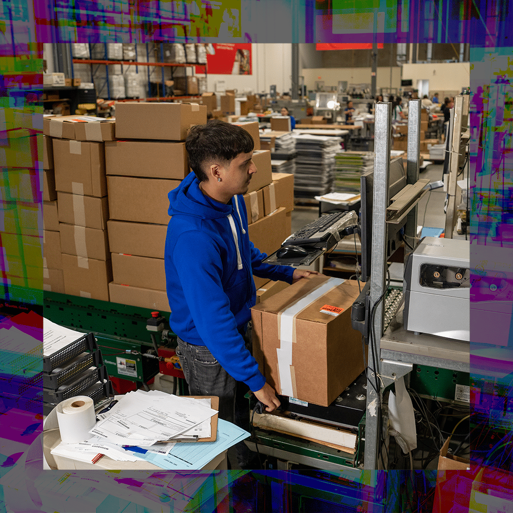 Employee checking a package